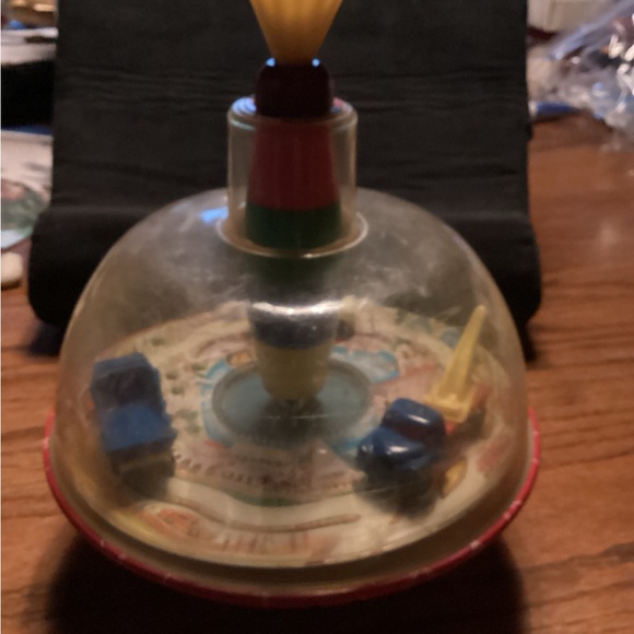 Other - Vintage Spinning Top. Has different vehicles in it.